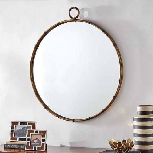 Miroir mural rond Marza finition laiton antique par iNSPIRE Q Modern