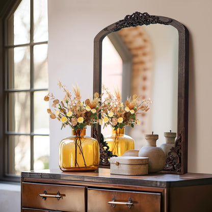 Miroir de sol sculpté en bois massif de forme arquée sur toute la longueur