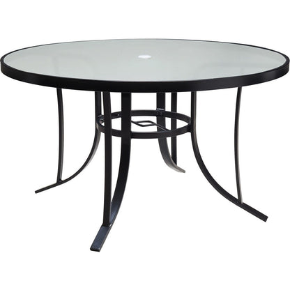 Ensemble de salle à manger Hanover Lavallette 5 pièces bleu océan avec 4 chaises fixes, une table ronde en verre de 132 cm, un parasol et un socle.