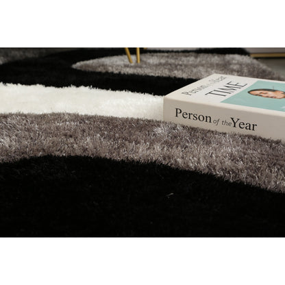 Tapis à poils longs Mateos au design abstrait