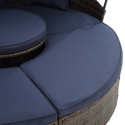 Lit de repos rond en rotin pour extérieur avec table basse relevable, canapé-lit profond bleu marine avec oreillers et coussins lavables