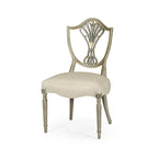 Chaise de salle à manger de style antique avec dossier en bouclier