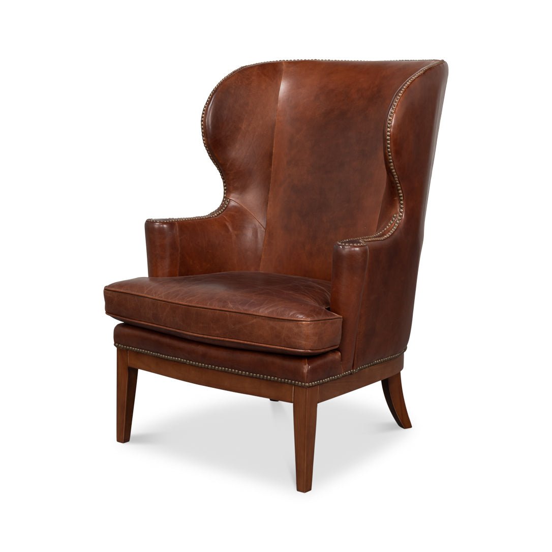 Fauteuil à oreilles en cuir marron de transition