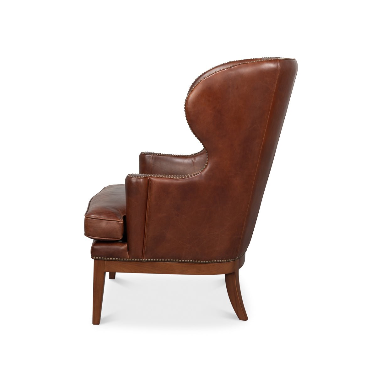 Fauteuil à oreilles en cuir marron de transition