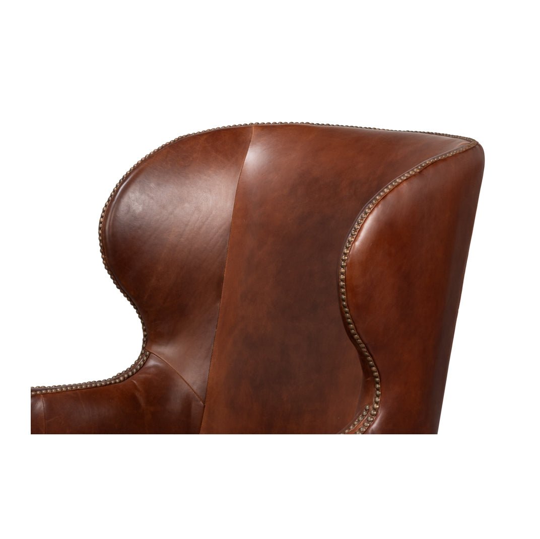 Fauteuil à oreilles en cuir marron de transition