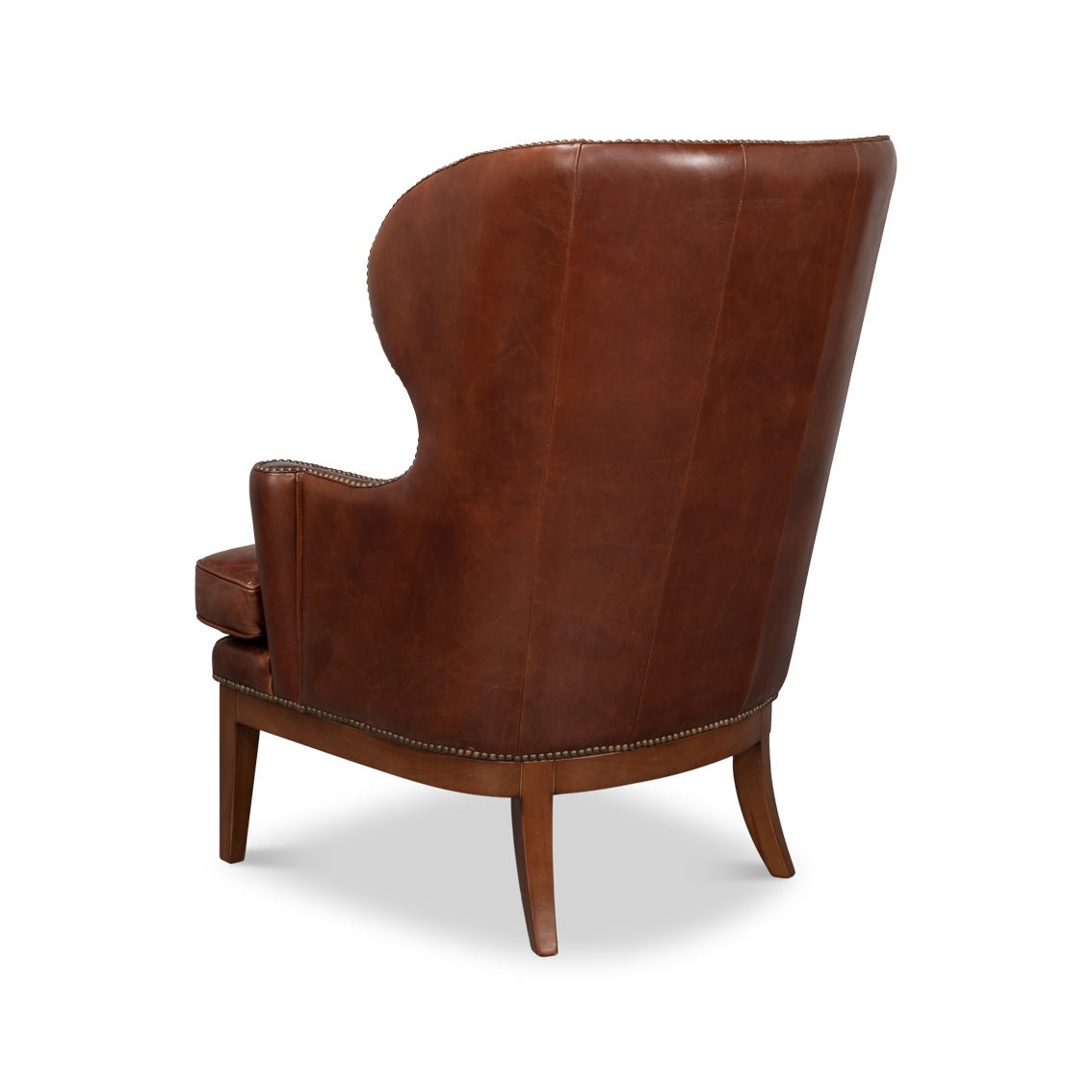 Fauteuil à oreilles en cuir marron de transition